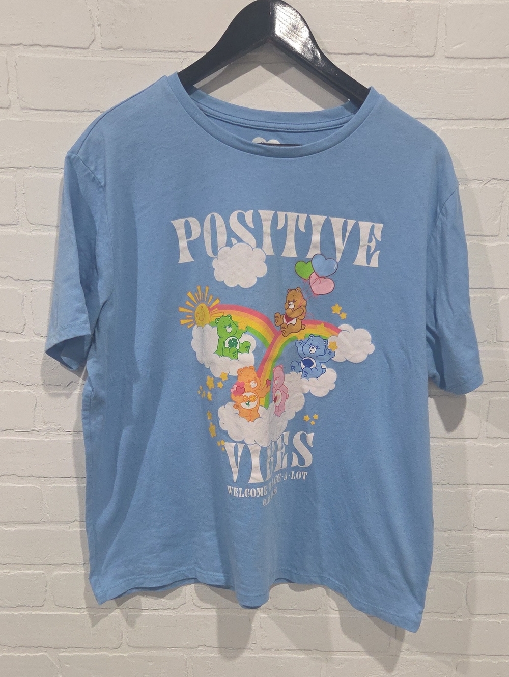 Care Bears Light Blue Short Sleeve Tee with Rainbow Graphic